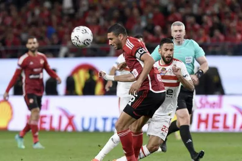 ناصر ماهر ورامي ربيعة خلال مباراة الأهلي والزمالك